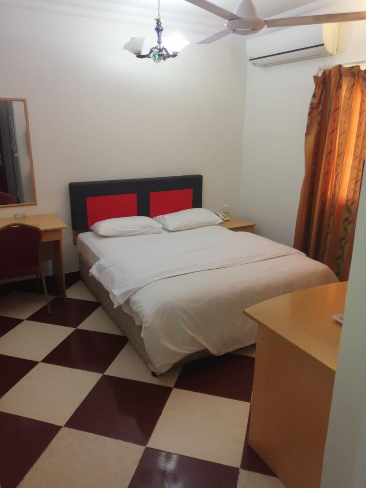 Sun City Hotel Muskat Bagian luar foto
